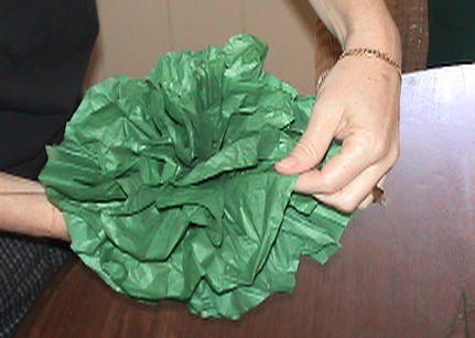 tissue paper flowers how to make. Cut long strips of paper.